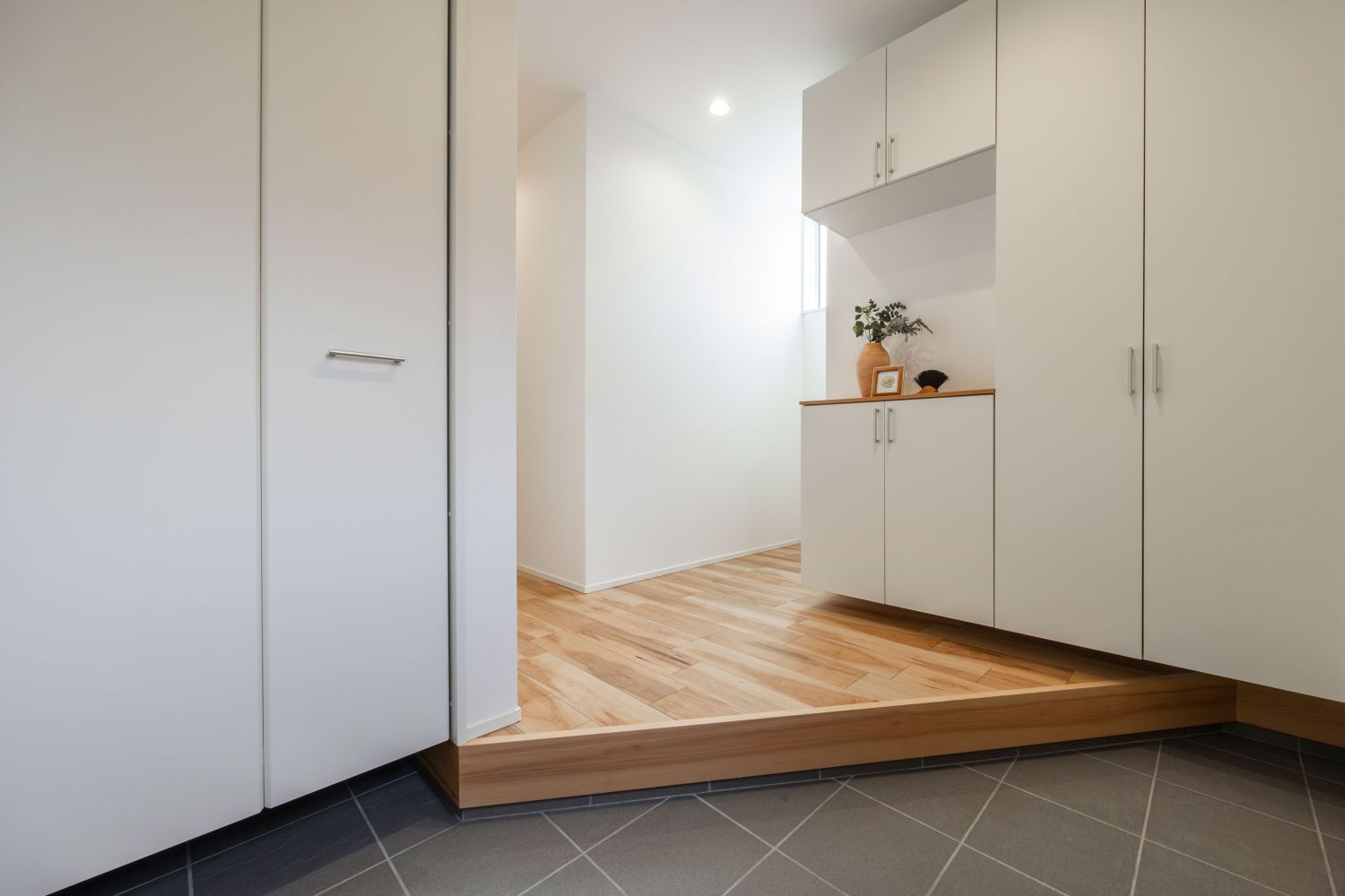 吹き抜けがつなぐ家